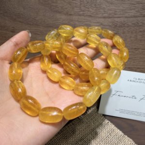 精品糸引き黄莹石糖豆手串